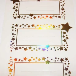 12 étiquettes adhésives de Noël - Étoiles dorées iridescentes