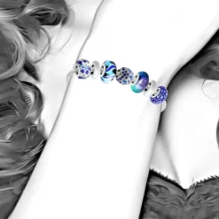 Bracelet de charms perles bleus et acier SC Crystal