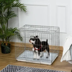 Cage pour chien pliable - plateau excrément coulissant - 2 portes verrouillable, poignée - dim. 61L x 43l x 50H cm - fer galvanisé PP blanc